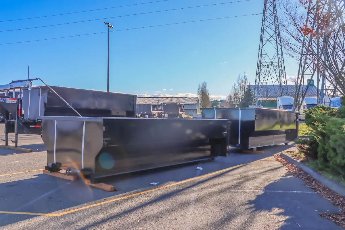 Roll-off dumpster ready for waste disposal at job site for 12 Yard Dumpster Rental in East Point